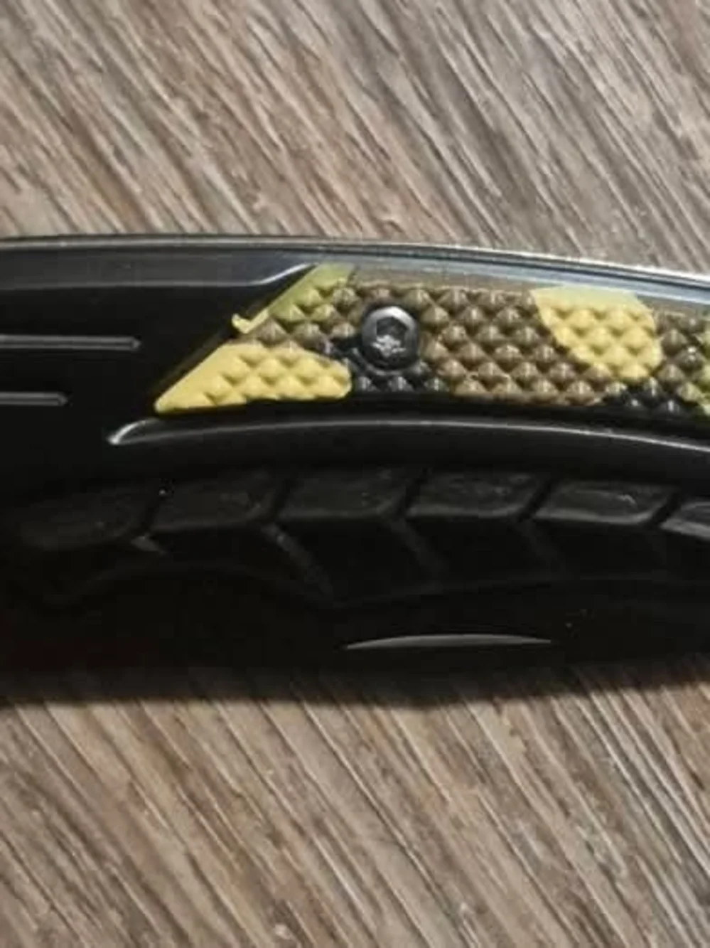 Black Folding Knife with Yellow Accent Handle